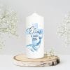 Auf dem Bild ist das Produkt: Taufkerze Wal und blaues Kreuz mit Wunschdaten bedruckt mit Namen Datum und Taufspruch Personalisiert zum Preis von €5.90 abgebildet.