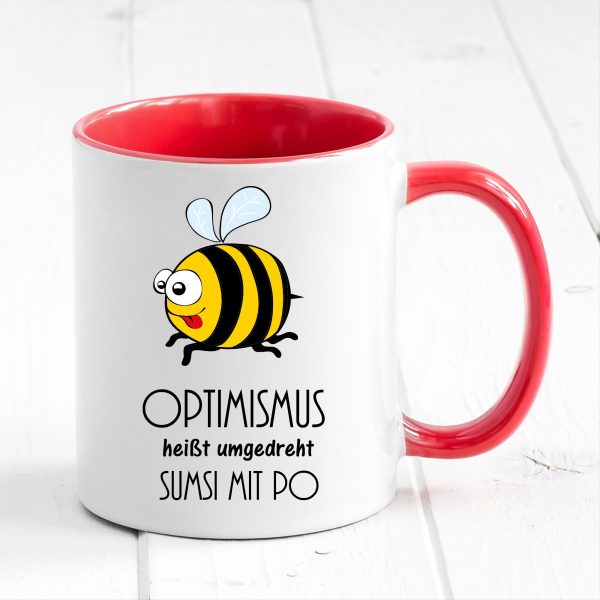 Auf dem Bild ist das Produkt: Tasse Biene Optimismus Sumsi mit Po Tasse Becher Geschenk Geburtstag zum Preis von €17.90 abgebildet.