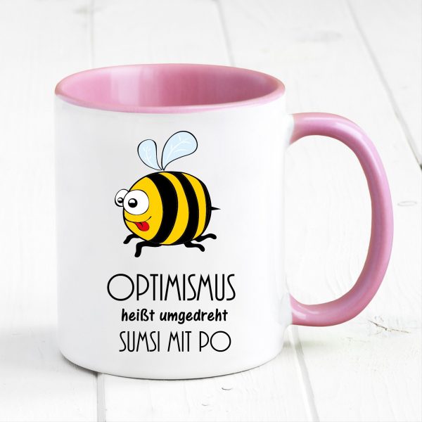 Auf dem Bild ist das Produkt: Tasse Biene Optimismus Sumsi mit Po Tasse Becher Geschenk Geburtstag zum Preis von €17.90 abgebildet.