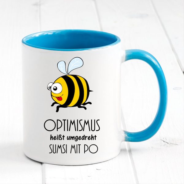 Auf dem Bild ist das Produkt: Tasse Biene Optimismus Sumsi mit Po Tasse Becher Geschenk Geburtstag zum Preis von €17.90 abgebildet.