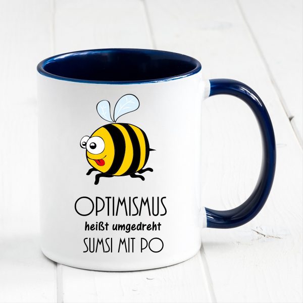 Auf dem Bild ist das Produkt: Tasse Biene Optimismus Sumsi mit Po Tasse Becher Geschenk Geburtstag zum Preis von €17.90 abgebildet.