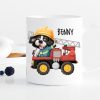 Auf dem Bild ist das Produkt: Kindertasse Tasse Hund im Feuerwehrauto personalisiert Wunschname Einschulungsgeschenk zum Preis von €18.9 abgebildet.