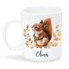 Auf dem Bild ist das Produkt: Keramik Tasse Eichhörnchen und Herbstblätter personalisiert Wunschname zum Preis von €18.9 abgebildet.