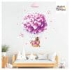Auf dem Bild ist das Produkt: Wandtattoo Mädchen Heißluftballon Kinderzimmer Waschbär Hase Blumen rosa lila Farbiges Wandbild zum Preis von €24.9 abgebildet.
