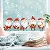 Auf dem Bild ist das Produkt: Fensterbild Weihnachtsmänner Wichtel 5 kleine Weihnachtwichtel Zwerge und Schneeflocken Fensteraufkleber wiederverwendbar zum Preis von €13.90 abgebildet.