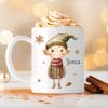 Auf dem Bild ist das Produkt: Weihnachtstasse Elfen mit einem Spielzeugauto Geschenk Glocke Lebkuchen Schneeflocken und Wunschnamen, personalisiertes Geschenk Tasse Becher Keramik zum Preis von €17.90 abgebildet.