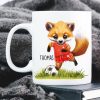 Auf dem Bild ist das Produkt: Bedruckte Tasse Becher Fuchs Fussballfan personalisiert mit Wunschname, Geschenk Geburtstag zum Preis von €17.90 abgebildet.