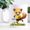 Auf dem Bild ist das Produkt: Bedruckte Tasse Becher Fuchs Fussballfan personalisiert mit Wunschname, Geschenk Geburtstag zum Preis von €17.90 abgebildet.