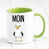 Auf dem Bild ist das Produkt: Bedruckte Keramiktasse Geschenkidee maritime Tasse Moin mit Möwe Geburtstagsgeschenk zum Preis von €17.9 abgebildet.