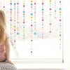 Auf dem Bild ist das Produkt: Fensterbild Karneval Konfettikette Girlande Farbspritzer wiederverwendbar Frühling bunte Punkte Fasching farbige Kreise zum Preis von €17.9 abgebildet.