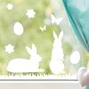 Auf dem Bild ist das Produkt: Fensteraufkleber Hasen mit Ostereiern und Schmetterlingen WIEDERVERWENDBAR zum Preis von €12.90 abgebildet.