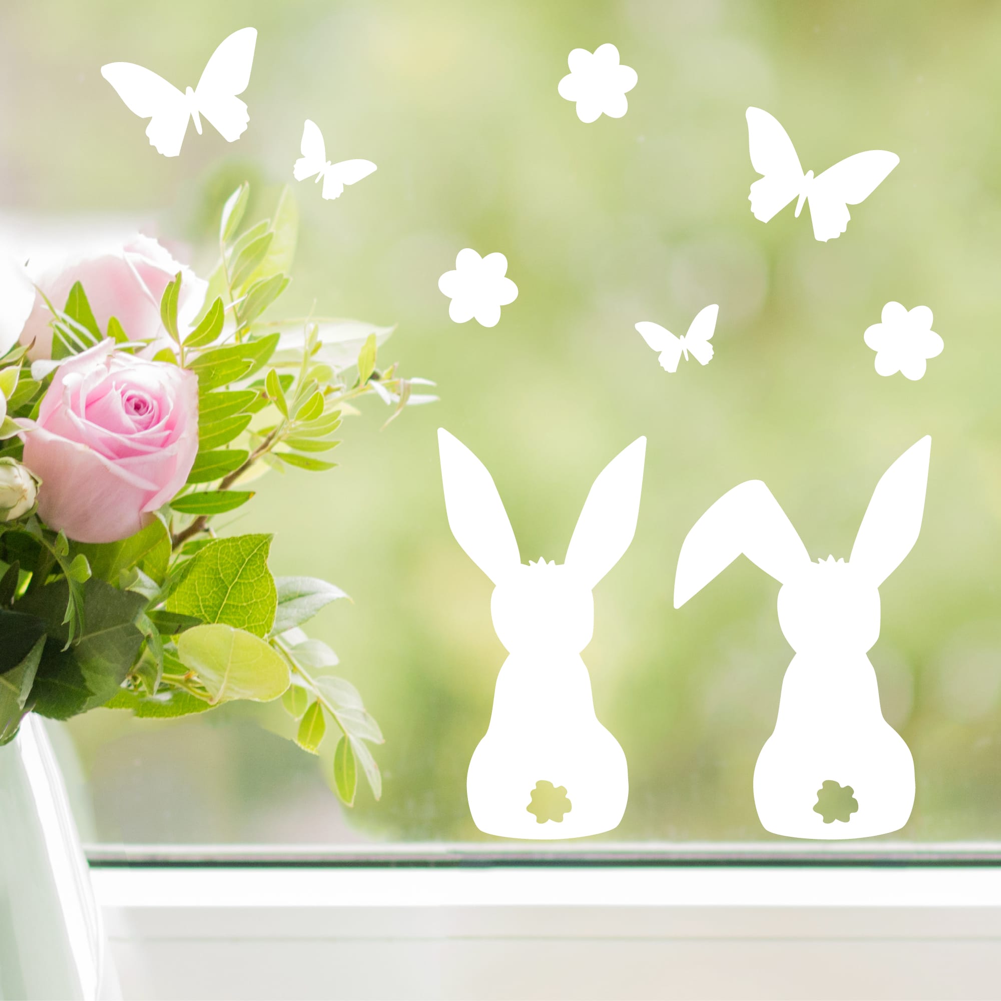 Fensteraufkleber Frühling Ostern drei Hasen Blümchen Schmetterlinge weiß WIEDERVERWENDBAR 23 Aufkleber im SetFensterbild Fensterdeko