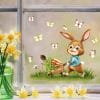 Auf dem Bild ist das Produkt: Fensterbild Frühling Ostern Hase mit Schubkarre Möhren Schmetterlingen Fensterdeko Kinderzimmer Kind Frühlingsdeko zum Preis von €13.9 abgebildet.