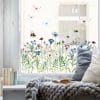 Auf dem Bild ist das Produkt: Fensterbild Kornblumenwiese wiederverwendbar blau pastell Blumenwiese mit Schmetterlingen Hummeln Fensterdekoration zum Preis von €13.9 abgebildet.