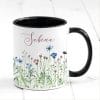 Auf dem Bild ist das Produkt: Tasse Wildblumen personalisiert farbig mit Wildblumen und dem Wunschnamen Natur Naturliebhaber zum Preis von €17.90 abgebildet.