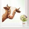 Auf dem Bild ist das Produkt: Fensterbild Kuh ins Fenster schauend braun schwarz reinschauend Kuhkopf wiederverwendbar Frühling Bauernhof Bulle Kalb zum Preis von €13.9 abgebildet.