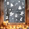 Auf dem Bild ist das Produkt: Fensterbild Weihnachtsset Lebkuchenmann Zuckerstange Glocke Schleife Stiefel Kerze Schneemann weiß Weihnachtsdekoration wiederverwendbar zum Preis von €13.9 abgebildet.