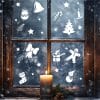 Auf dem Bild ist das Produkt: Fensterbild Weihnachtsset Lebkuchenmann Zuckerstange Glocke Schleife Stiefel Kerze Schneemann weiß Weihnachtsdekoration wiederverwendbar zum Preis von €13.9 abgebildet.