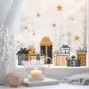 Auf dem Bild ist das Produkt: Fensterbild Weihnachten Geschenke Set mit Sterne schwarz goldähnlich minimalistisch Fensteraufkleber Weihnachtsdekoration wiederverwendbar zum Preis von €13.9 abgebildet.