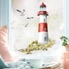 Auf dem Bild ist das Produkt: Fensterbild Leuchtturm Leuchtfeuer maritim rot blau grün Ostsee Nordsee Meer Urlaub Fensterdeko Küche Frühlingsdeko Möwen Warnemünde zum Preis von €13.9 abgebildet.