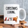 Auf dem Bild ist das Produkt: Tasse Dackel Weihnachten bedruckt Dackel Christmas loading Wunschnamen Weihnachtsgeschenk zum Preis von €12.9 abgebildet.
