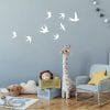 Auf dem Bild ist das Produkt: Wandtattoo fliegende Schwalben Vögel Schwarm Dekoration Wohnzimmer Wandgestaltung Wandaufkleber zum Preis von €14.90 abgebildet.